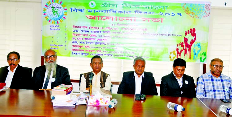 Justice (Retd) AHM Shamsuddin Chowdhury, among others, at a discussion organised on the occasion of World Human Rights Day by Green Peace Bangla at the Jatiya Press Club on Sunday.