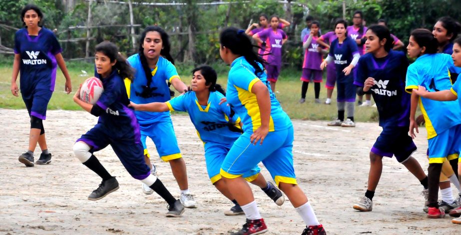 An action from the semi-final match of the Walton National Women's Rugby Competition between Narail District team and Manikganj District team at the Paltan Maidan on Monday.