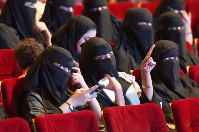 Saudi women attend a rare cinema screening at a film festival in Riyadh in October 2017.