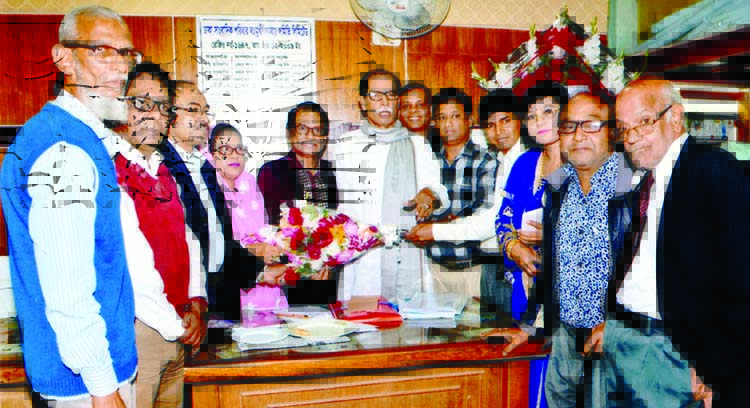 Newly elected executive members of 'Dhaka Sangbadik Paribar Bahumukhi Samabaya Samity Limited' at the charge taking ceremony in the Jatiya Press Club on Tuesday.