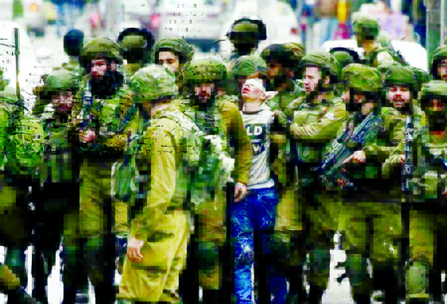 Fawzi Muhammad al-Juneidi, 16, from the southern occupied West Bank city of Hebron was detained by 23 Israeli soldiers during protests.