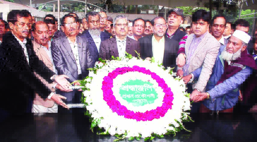 Newly-appointed Chief Engineer of LGED Md Abul Kalam Azad along with high officials placing wreaths at the portrait of Bangabandhu Sheikh Mujibur Rahman at Bangabandhu Memorial Museum in the city yesterday.