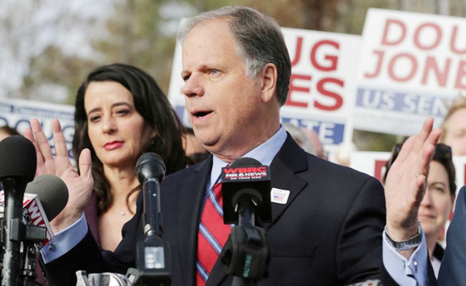 Reports said former prosecutor Jones secured 49.6 percent of the vote.