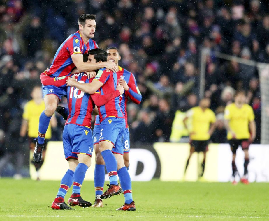 Crystal Palace's James McArthur (centre) celebrates scoring his side's second goal of the game with team-mates during the English Premier League match between Crystal Palace versus Watford at Selhurst Park, London on Tuesday.