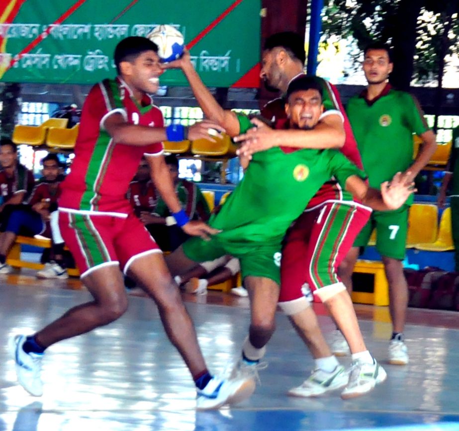 A view of the match of the Khokon-Udayan Builders Victory Day Handball Tournament at the Shaheed (Captain) M Mansur Ali National Handball Stadium on Thursday.