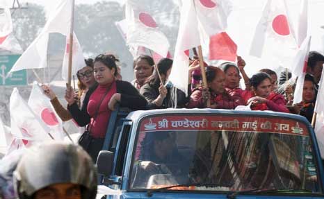 Nepal communist party supporters participate in a victory rally in Kathmandu