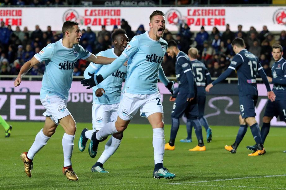 Lazio midfielder Sergej Milinkovic-Savic celebrates after scoring his side's second goal during the Italian Serie A soccer match between Atalanta and Lazio at the Atleti Azzurri d'Italia stadium in Bergamo, Italy on Sunday.