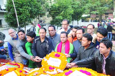 BARISAL: Leaders of Barisal Reporters' Unity placing wreaths at the martyrs' monuments on the Victory Day on Saturday.