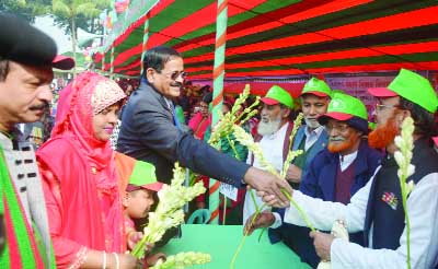 BOGRA: HabIbur Rahman MP greeting freedom fighters at a reception accorded to them marking the Victory Day at Dhunot Upazila on Saturday.