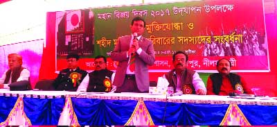 SAIDPUR(Nilphamari): Bazlul Rashid, UNO, Saidpur Upazila speaking at a reception and crest giving ceremony to the freedom fighters and their family on the occasion of the Victory Day arranged by District Administration, Saidpur on Saturday . Among