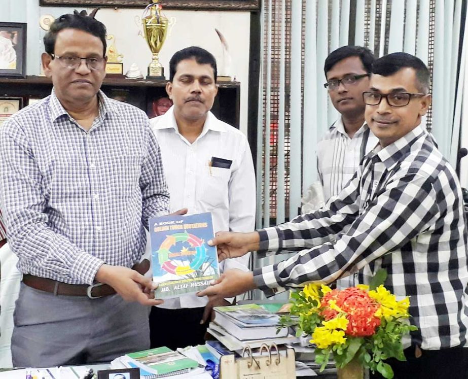 Prof Moazzem Hossen Mollah, Principal of Dhaka College receiving a book as 'welcome gift' namely 'A Book of Golden Touch Quotations' from its writer Md. Altaf Hossen, Chairman, Manikganj District Green Club in a formal ceremony held on the College cam