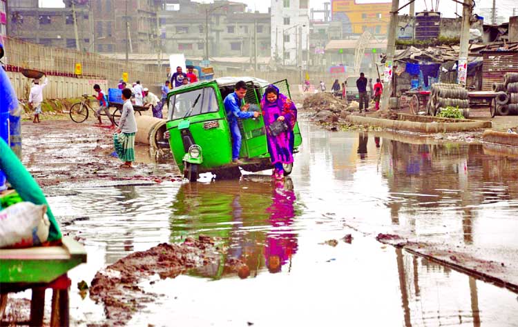 The main thoroughfare is in dilapidated condition as drainage stink water being stagnant, causing sufferings to commuters and pedestrians as well. But the authorities concerned do not pay any heed to the matter. This photo was taken on Monday.