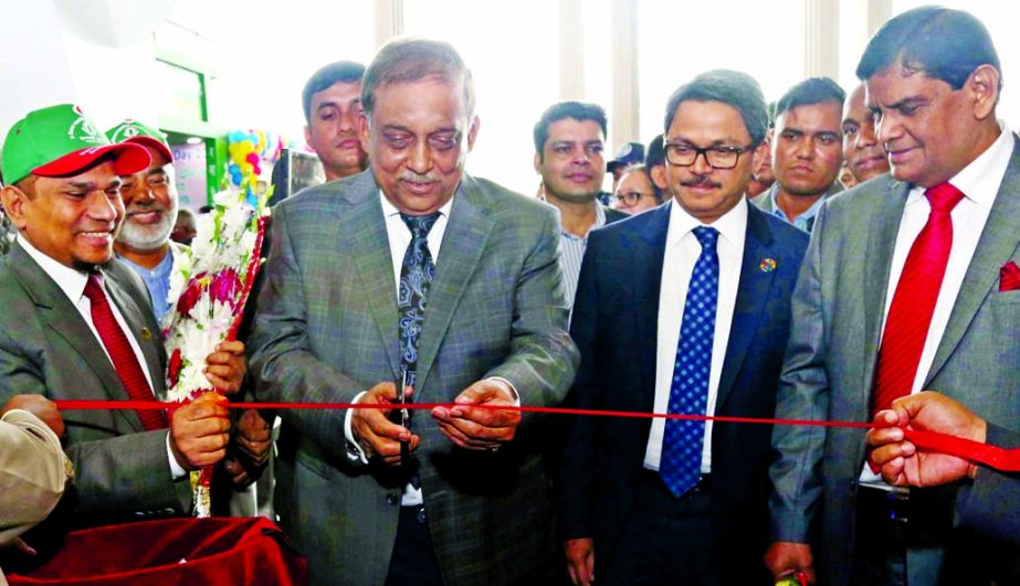 Home Minister Asaduzzaman Khan Kamal, inaugurating the Islami Bank stall at a fair organized on the occasion of International Migrantsâ€™ Day on Monday at Bangabandhu International Conference Center in the city. State Minister for Ministry of Foreig