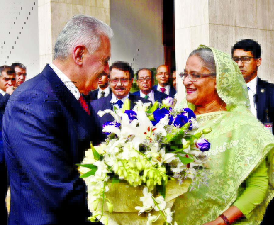 Prime Minister Sheikh Hasina receiving visiting Turkish Prime Minister Binali Yildirim at PMO on Tuesday. BSS photo