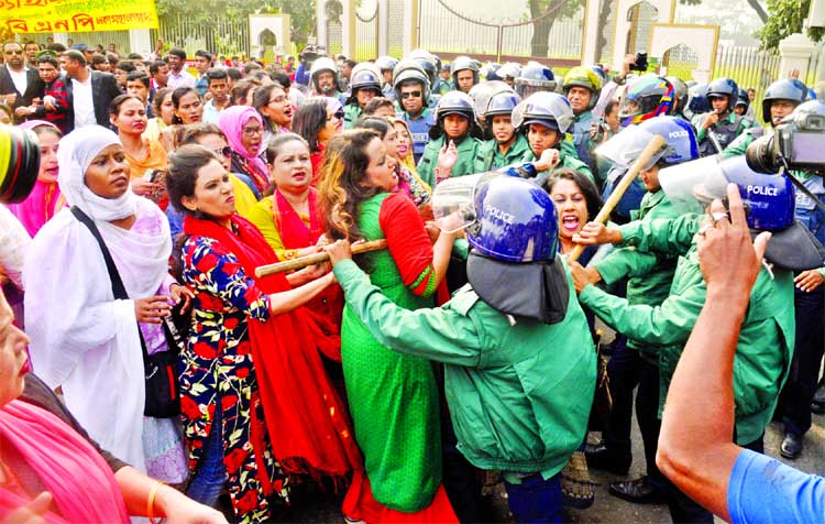 BNP women leaders and other activists engaged in scuffle with police while they staged demonstration in city following the filing of two cases against Begum Khaleda Zia by ACC. This photo was taken from in front of Education Directorate on Wednesday.
