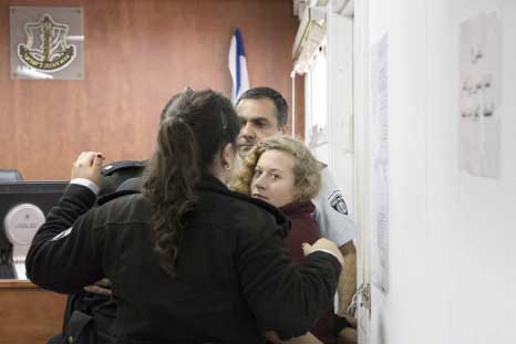 Palestinian Ahed Tamimi is escorted at a military court near Jerusalem on Wednesday.