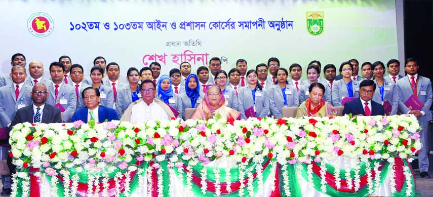 Prime Minister Sheikh Hasina poses for photograph with the recipients of certificates at the concluding ceremony of Law and Administration Course at the Academy of Bangladesh Civil Service Administration in the city's Shahbag on Thursday.