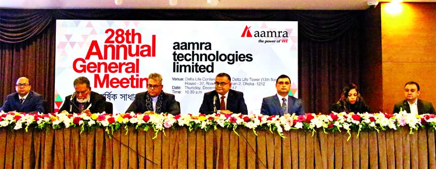 Sayed Farook Ahmed, Chairman of Aamra Technologies Limited, presiding over its 28th AGM at a city hotel on Thursday. The AGM approved 10 percent Cash Dividend for the year 2017. Sayed Farhad Ahmed, Managing Director, Sayada Munia Ahmed and Fahmida Ahmed,