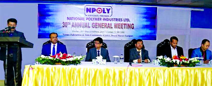 Golam Morshed, Chairman of National Polymer Industries Limited, presiding over its 30th AGM at a hotel in Gazipur on Thursday. Riyad Mahmud, Managing Director, Rafiqul Islam, Director from ICB, Mostafizur Rahman Sajid and Jamal Uddin Ahmed, Independent Di