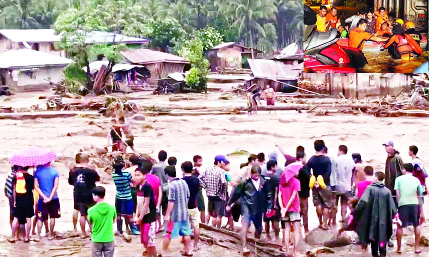 Tropical Storm Tembin has lashed the Philippines' second-largest island of Mindanao since Friday. Rescue workers evacuate flood-affected residents in Davao (inset).