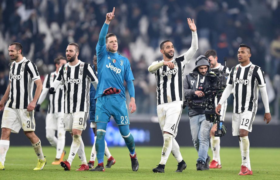 Juventus' players celebrate their victory for 1-0 over Roma at the end of an Italian Serie A soccer match in Turin, Italy on Saturday.