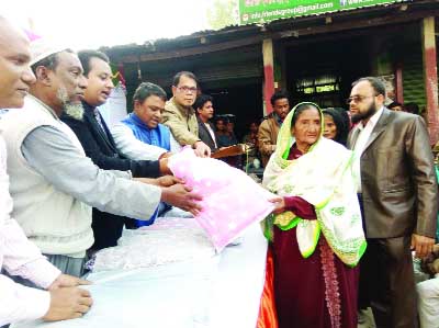 DINAJPUR (South): Winter clothes were distributed among clod- hit people by Dinajpur Friends Group at Rangamati BGB camp of Fulbari upazila on Friday.