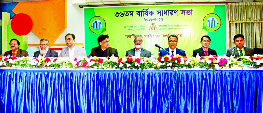 Kamal Hossain Gazi, Chairman of Aziz Pipes Limited, presiding over its 36th AGM at city's IDEB auditorium on Sunday. The AGM approved 5 percent stock dividend for the year 2016-2017. Md. Nurul Absar, Managing Director, Khondhokar Nuruzzaman, Md. Sultan J