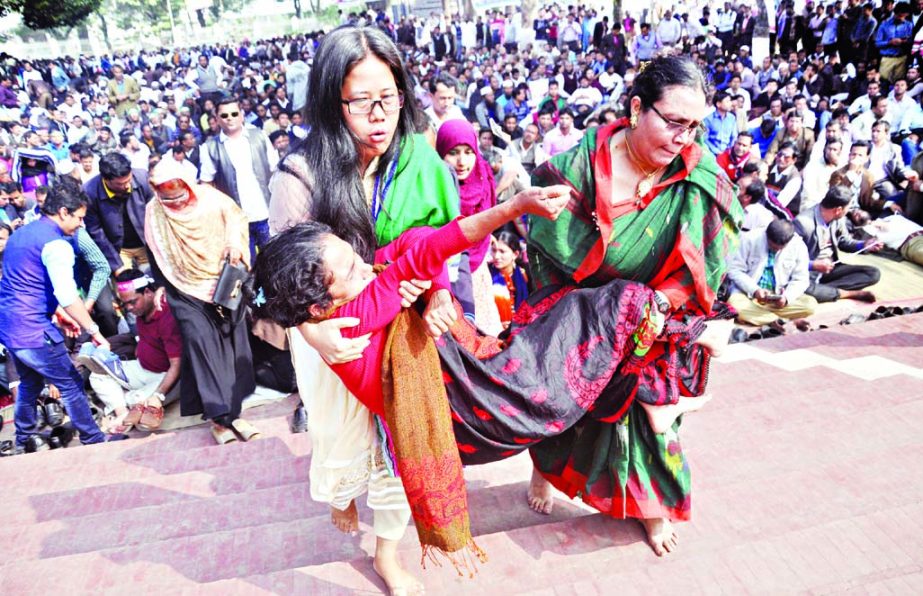 About 40 primary assistant teachers fell ill on second day of their hunger strike for removing pay discrimination. This photo was taken from central Shaheed Minar on Sunday.