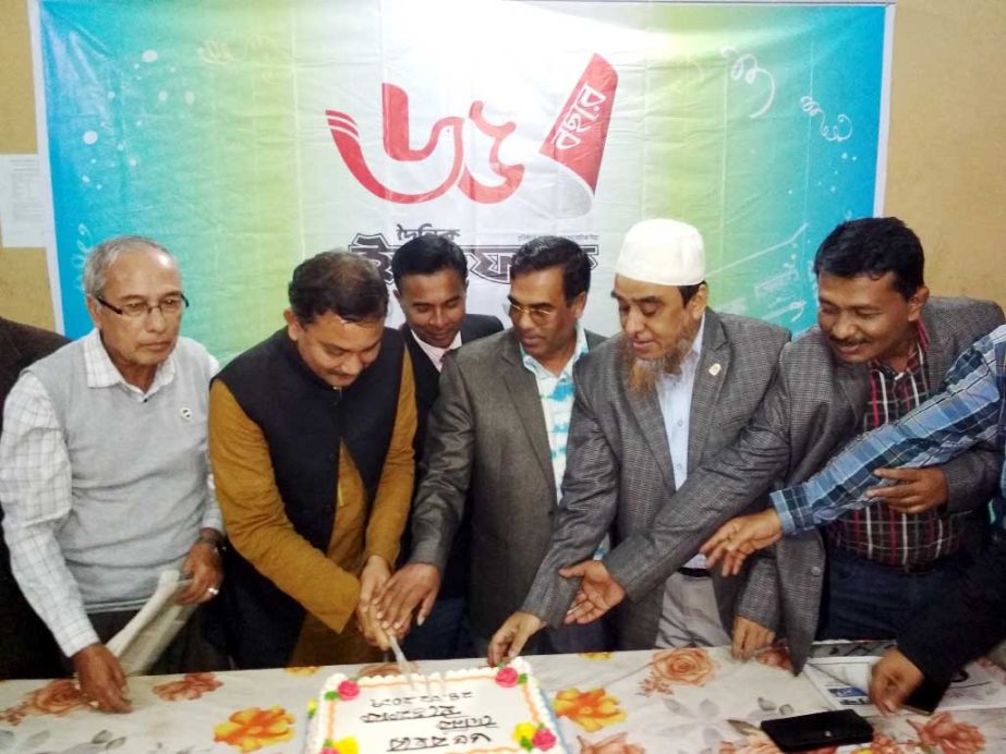 Ashak Ullah Rafik MP cutting cake on the occasion of the 65th founding anniversary of the daily Ittefaq organised by Cox's Bazar Press Club on Sunday.