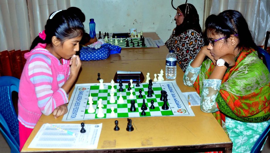 Scene from the 4th round games of the Dr. Mirza Akmal Hossain Open FIDE Rating Women's Chess Tournament organised by Bangladesh Mohila Daba Samity held at Bangladesh Chess Federation hall-room at 2nd floor of National Sports Council old building on Monda