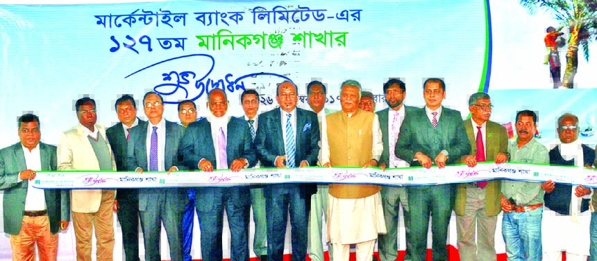 AKM Shaheed Reza, Chairman of Mercantile Bank Limited, inaugurating its 127th branch at Manikgonj on Tuesday. SM Abdul Mannan, former MP of Manikgonj-2, Mati Ul Hasan, AMD of the bank and Tosaddek Hossain Titu, Director of FBCCI among others were present.