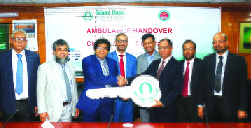 Arastoo Khan, Chairman of Islami Bank Bangladesh Limited, handing over the key of an ambulance to Md. Shamsuddoha, Chief Executive Officer of Chittagong City Corporation (CCC) on Thursday at the bank head office in the city. Md. Mahbub-ul-Alam, AMD, Abu R