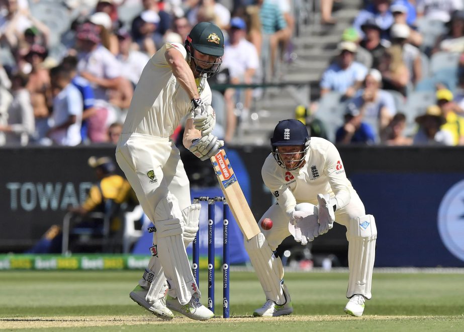 Australia's Shaun Marsh, left, bats in front of England's Jonny Bairstow during their Ashes cricket Test match in Melbourne, Australia on Tuesday.