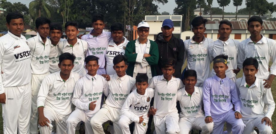 Members of Singair Model Pilot High School team, the champions of the Cricket Tournament of the Winter Sports Competition of Manikganj pose for a photo session at Singair in Manikganj on Tuesday. Singair Model Pilot High School beat Dholla Union Council H