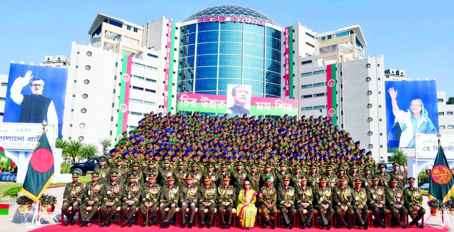 Prime Minister Sheikh Hasina attended a photo session with cadet officers after the President's Parade marking the obtaining commission of 75 BMA Long Course of the Bangladesh Military Academy (BMA) at BMA Parade Ground in Bhatiari yesterday noon. Ph