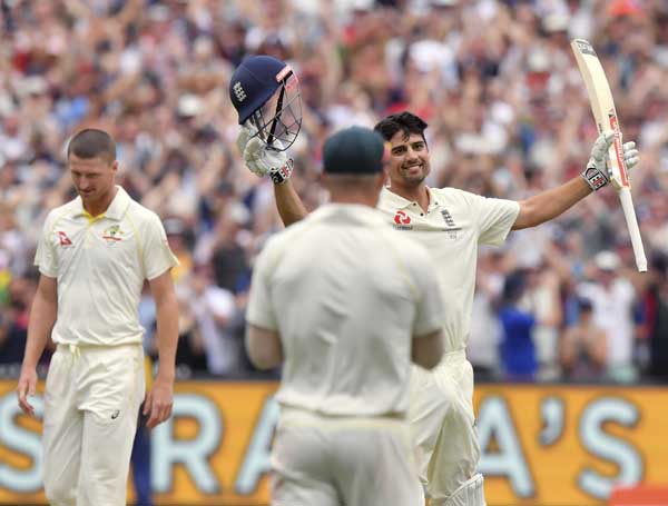 England's Alastair Cook celebrates making 200 runs against Australia during the third day of their Ashes cricket Test match in Melbourne, Australia on Thursday.