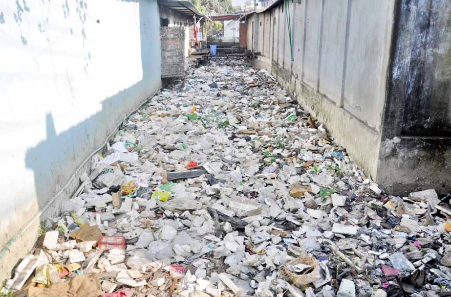 A drain at Abdul Ali Hat under Ward No 9 in the Port City has been filled with garbages for long time . No step has been taken by the Chittagong City Corporation despite repeated request by the local people.
