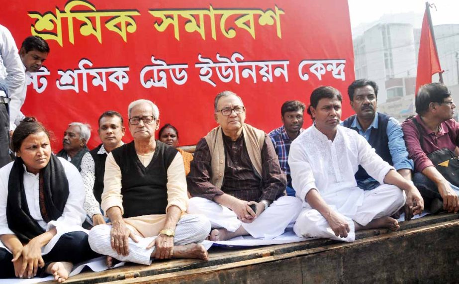 Participants at a rally organised by Garments Sramik Trade Union Kendra in front of the Jatiya Press Club on Friday to meet its various demands including Tk 10,000 as basic salary of garments employees.