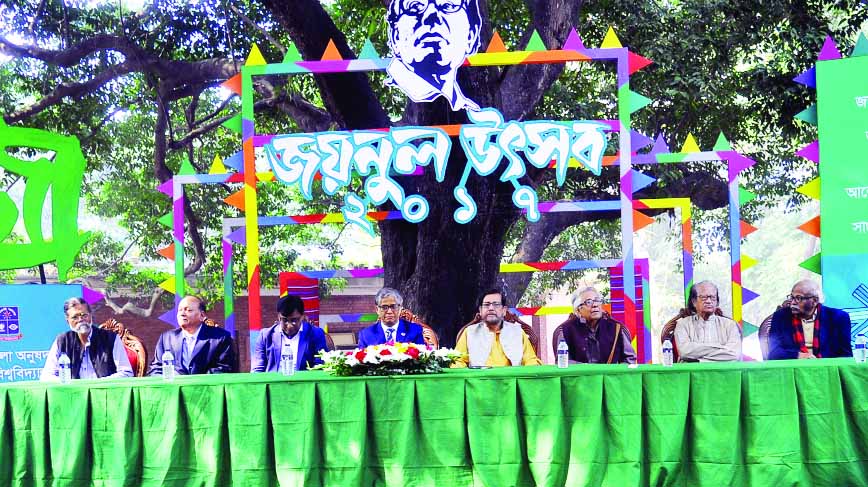 Cultural Affairs Minister Asaduzzaman Noor, among others, at the 'Zainul Utsab' organised on the occasion of birth anniversary of Shilpachariya Zainul Abedin by the Faculty of Fine Arts of Dhaka University on its premises on Friday.
