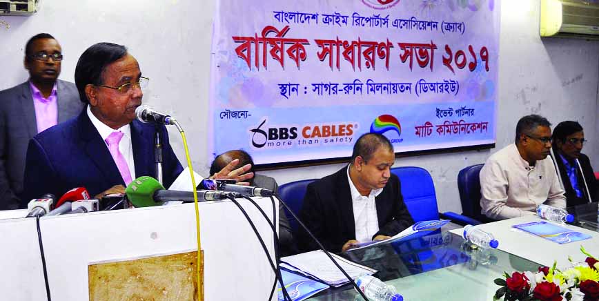 Railway Minister Mujibul Haque speaking at the annual general meeting of Bangladesh Crime Reporters Association in DRU auditorium on Friday.