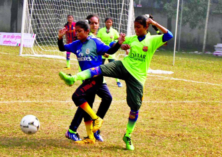 A moment of the match of the Dhaka District Women's Football Competition between Dhamrai Red team and Dhamrai Green team at the Sultana Kamal Women's Sports Complex in the city's Dhanmondi on Friday. Dhamrai Red team beat Dhamrai Green team by 3-0 goal