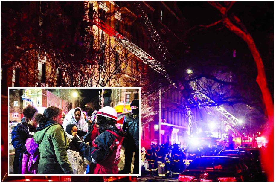Firefighters respond to a building fire on Thursday night in the Bronx borough of New York. The Fire Department of New York says a blaze raging in the Bronx apartment building has seriously injured more than a dozen of people. Evacuees from a deadly fire