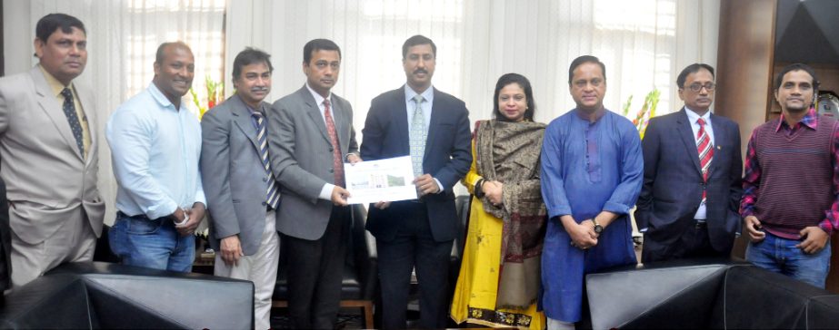 Authority of Secopndary and Higher Secondary Education Board handing over JSC results to Prof Nisar Uddin Ahmed, Acting Mayor CCC at his office yesterday.