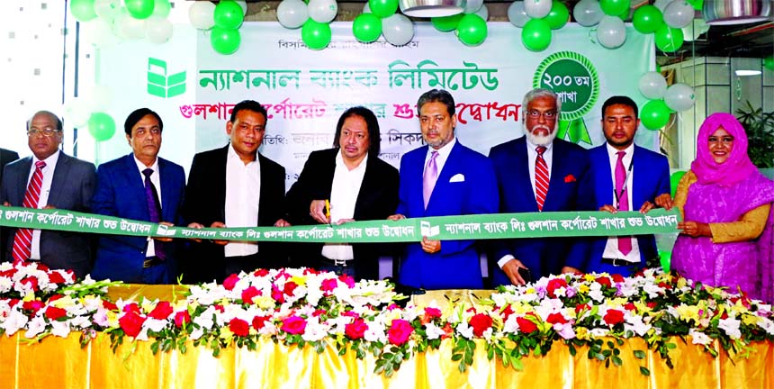 Ron Haque Sikder, Director of National Bank Limited, inaugurating its 200th branch at city's Gulshan area (Gulshan Corporate Branch) on Thursday. Choudhury Russel Ahmed, Managing Director, Wasif Ali Khan and M A Wadud, AMDs of the bank among others were