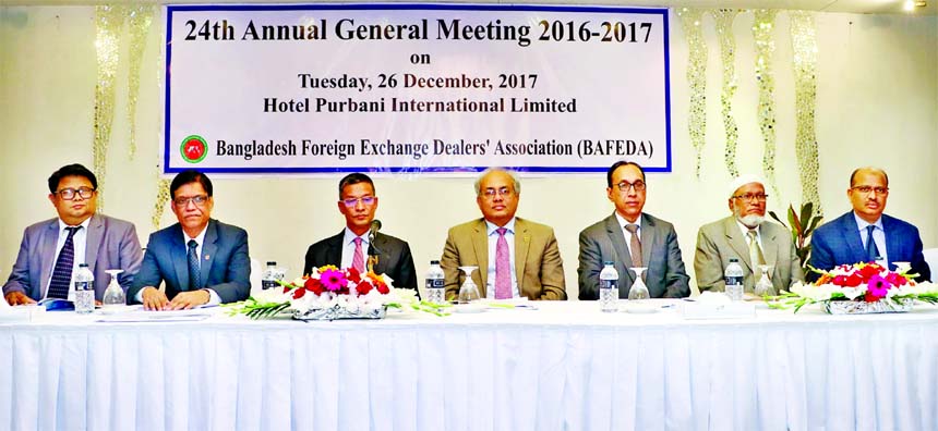 Md. Abdus Salam Azad, Vice-Chairman of Bangladesh Foreign Exchange Dealers' Association, presiding over its 24th AGM at a city auditorium on Tuesday. Mohammad Shams-Ul Islam, Executive member and Managing Director of Agrani Bank Limited, Md. Abdul Qayyum