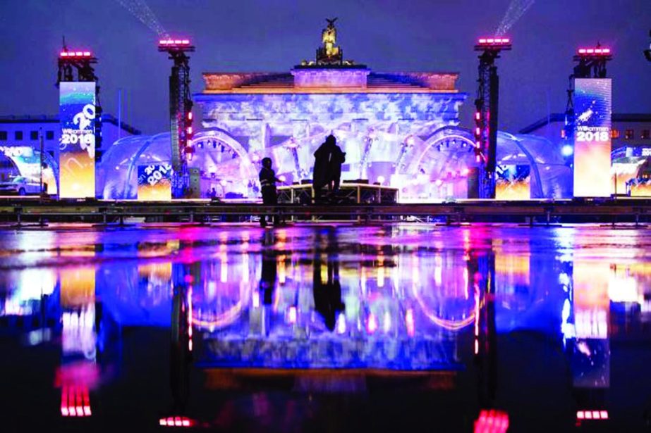 Germanyâ€™s illuminated Brandenburg Gate for New Yearâ€™s Eve. Internet photo