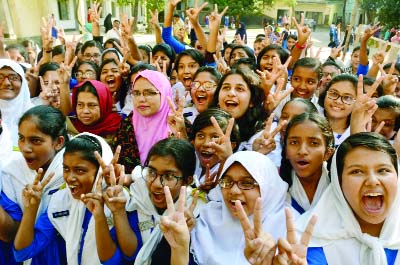 BOGRA: Students of Bogra Government Girlsâ€™ High School showing V- sign after publishing of PSC and JSC results on Wednesday.