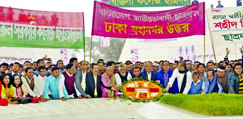 BNP Secretary General Mirza Fakhrul Islam Alamgir along with party colleagues placing floral wreaths at the mazar of Shaheed President Ziaur Rahman on Monday marking the 39th founding anniversary of Jatiyatabadi Chhatra Dal.