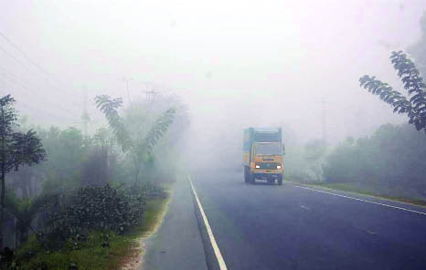 ISHWARDI (Pabna): Vehicles movement have been hampered at Ishwardi Upazila due to foggy weather. This picture was taken from Joynagar Boardghar area in Solimpur Union on Sunday.