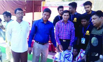 KISHOREGANJ: Surjoyduo, a socio-cultural organisation distributing warm clothes among the cold-hit people at Kishoreganj Club premises on Saturday noon. Among others, ADC (Gen) Torafder Md Akhter Jamil attended as Chief Guest. Surjoyduo Coordinator M